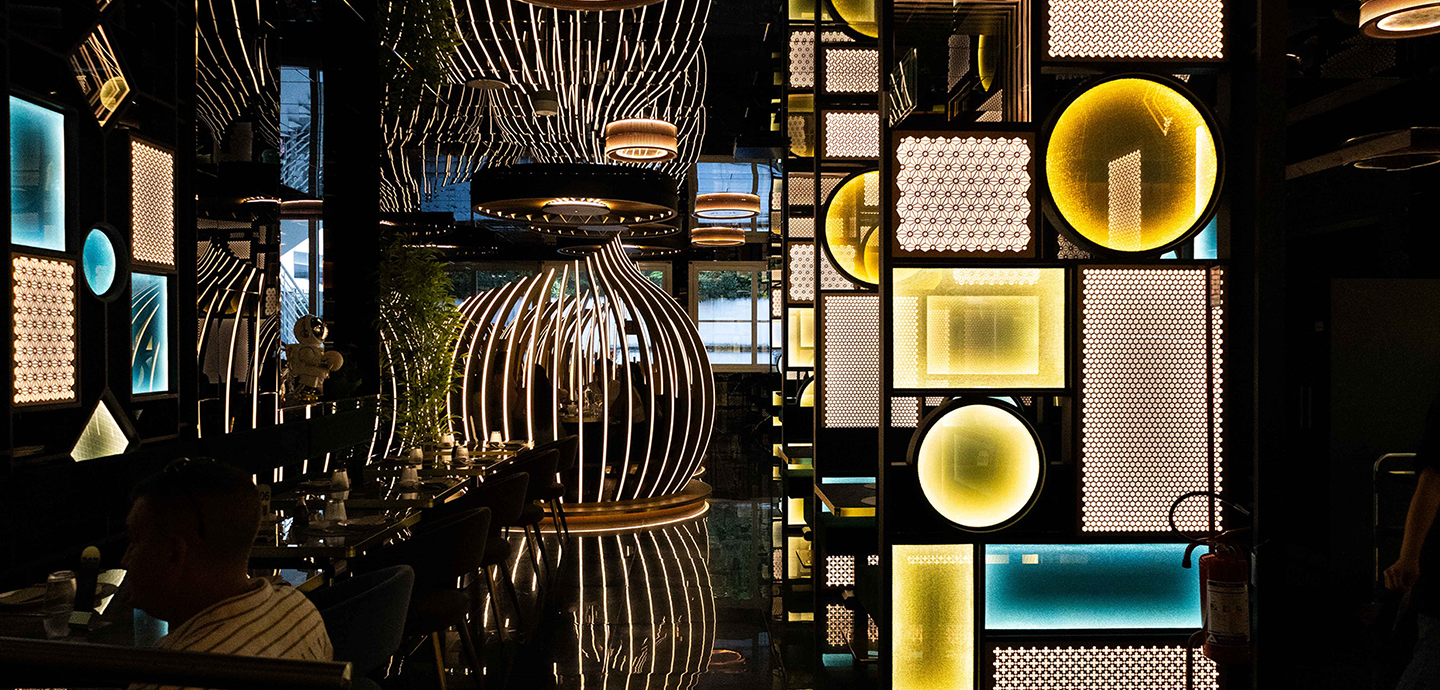 MODO restaurant interior with illuminated decorative panels